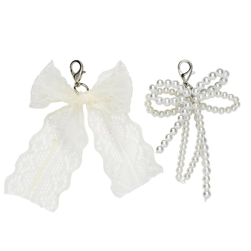 Hangers - strikken zilver & wit