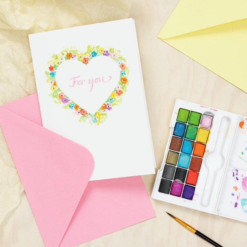 een valentijnskaartje met aquarelverf