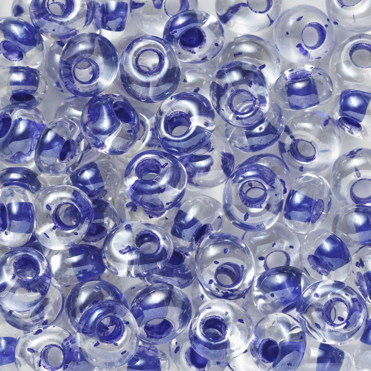 TOHO Magatama kralen - 4 mm - #348 blauw kern transparant