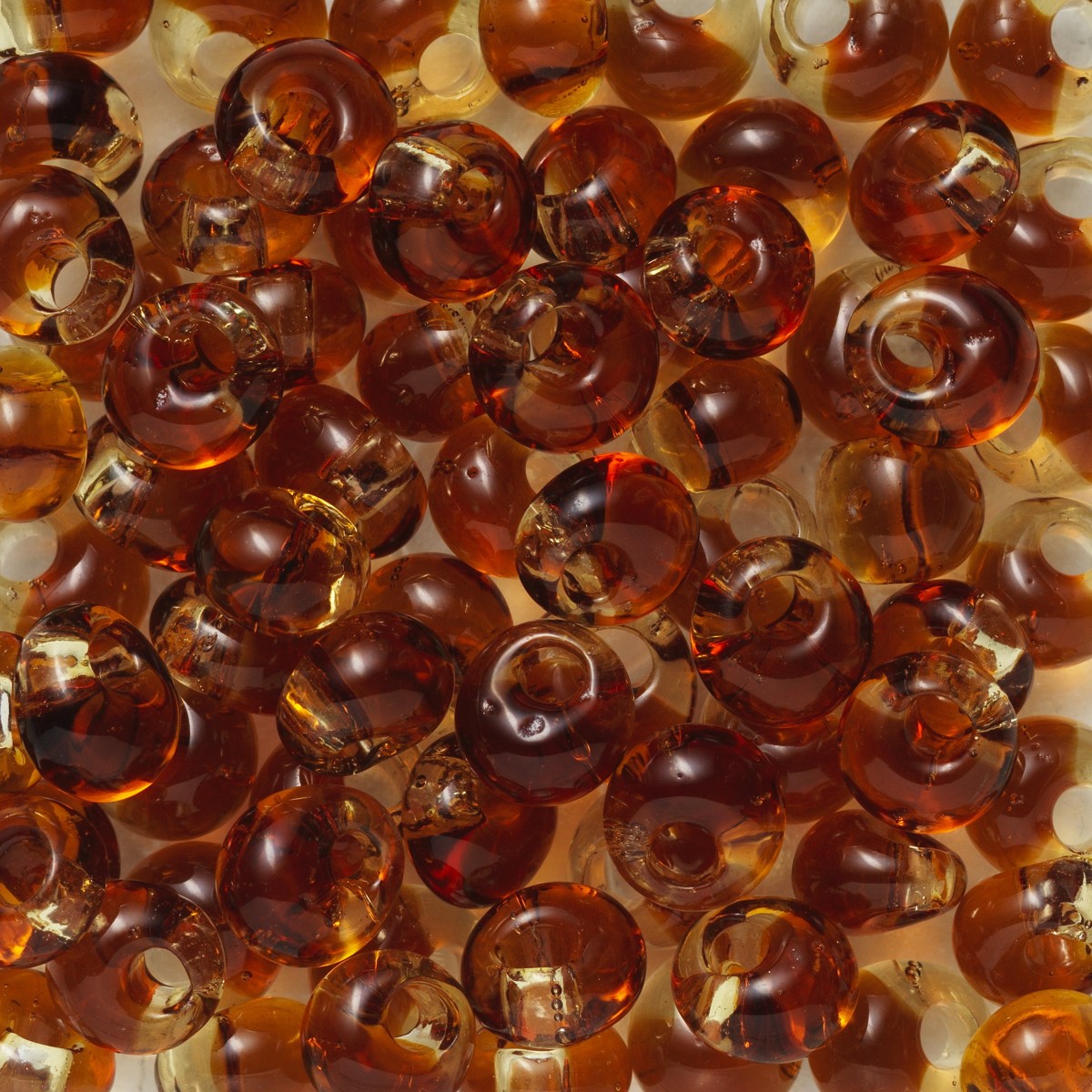 TOHO Magatama kralen - 4 mm - #M0202 bruin transparant