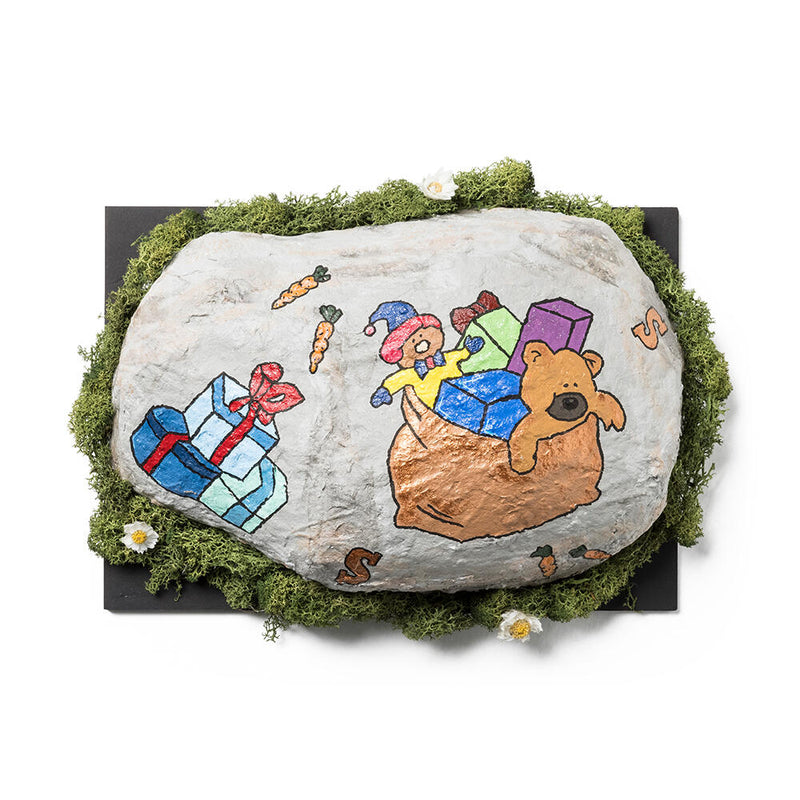 een happy stone met cadeautjes
