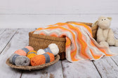 haakpakket baby ripple deken - oranje